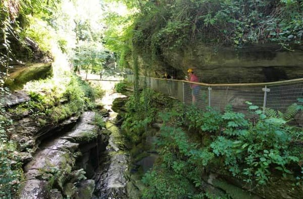 Lady on the gorge trail at How Stean Gorge visitor attraction Yorkshire Dales