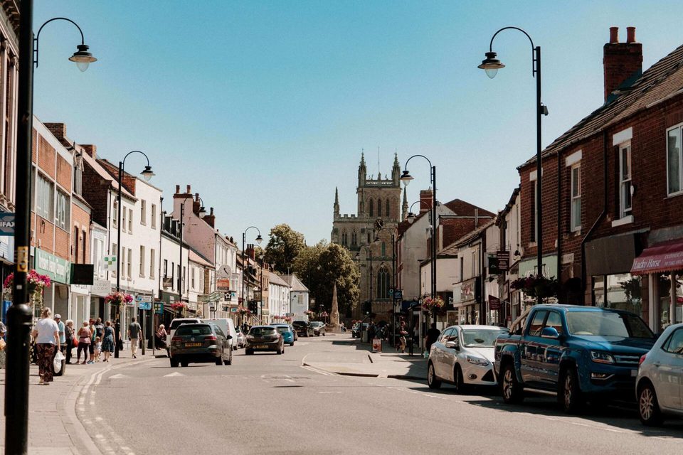 A street in Selby with the Abbey in the background